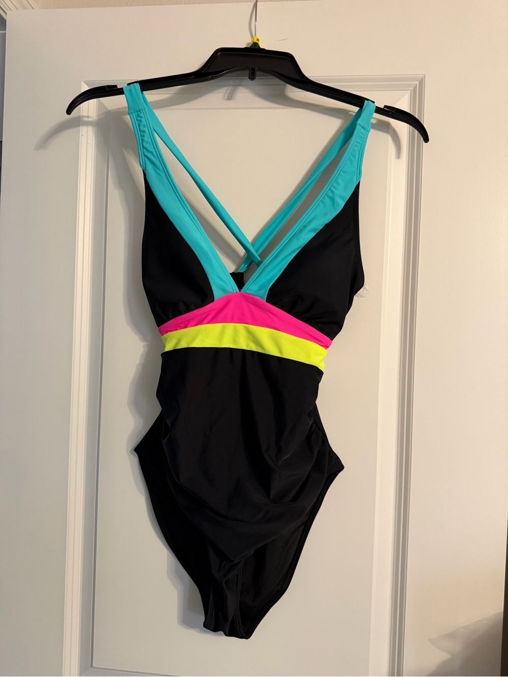 Black One-Piece Swimsuit with Aqua Straps and Neon Pink & Yellow Accents